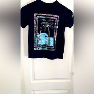 Boys skeleton surfer shirt. Size 10/12.